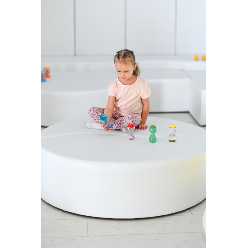 Grande table blanche salle sensorielle